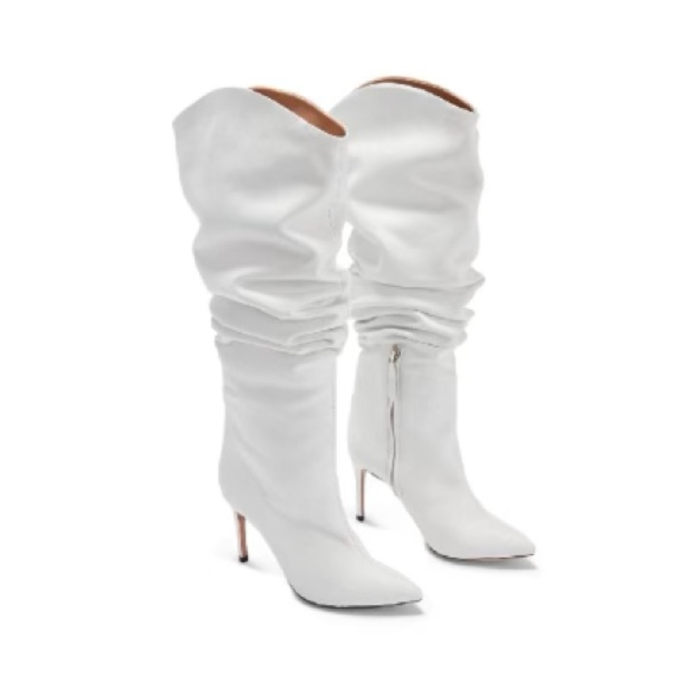 Schultz white leather over the knee boots.